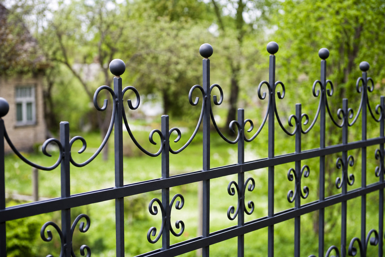Ornamental iron fence installation